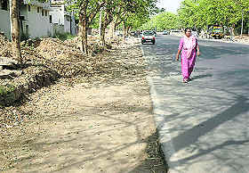 Road widening in Sector 10 has forced residents to walk on the road ...