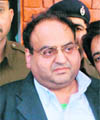 <b>Manjit Singh Rattu</b> in the custody of Panchkula cops. - nat4