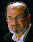 Controversial British author Salman Rushdie looks at the audience