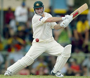 Australia's captain Steve Waugh hits a four on the way to his century in the first Test against Bangladesh in Darwin on Saturday