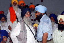 SAD (A) chief Simranjit Singh Mann along with his son in the Jalandhar Court Complex on Monday.