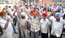 jalandhar tribune punjab employees roadways protest bus stand near