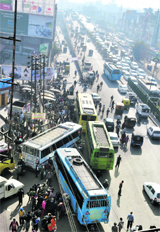 Roadways staff block the entrance of Shaheed Sukhdev Thapar Inter State Bus Terminus following a strike in Ludhiana on Friday. 